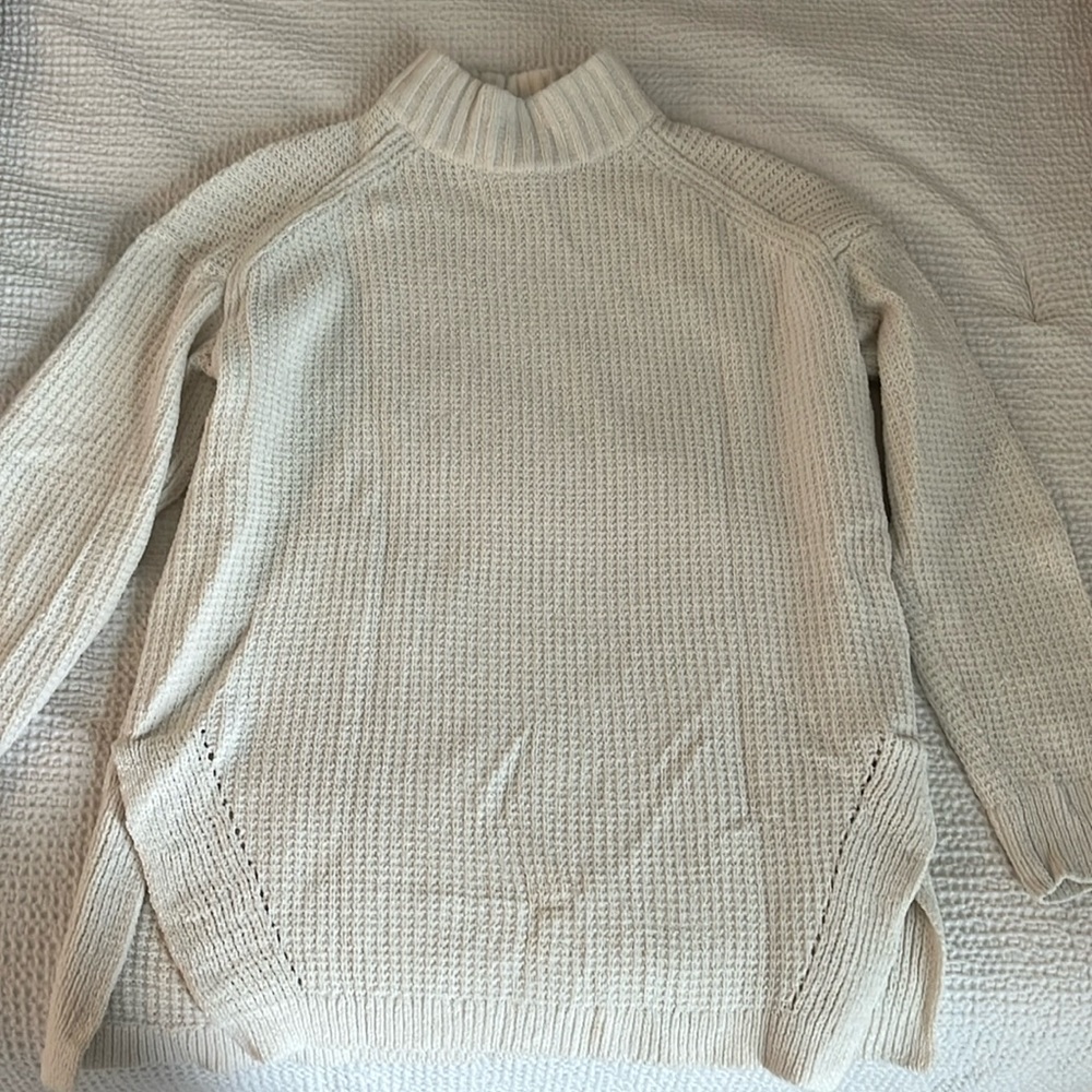 White turtleneck sweater